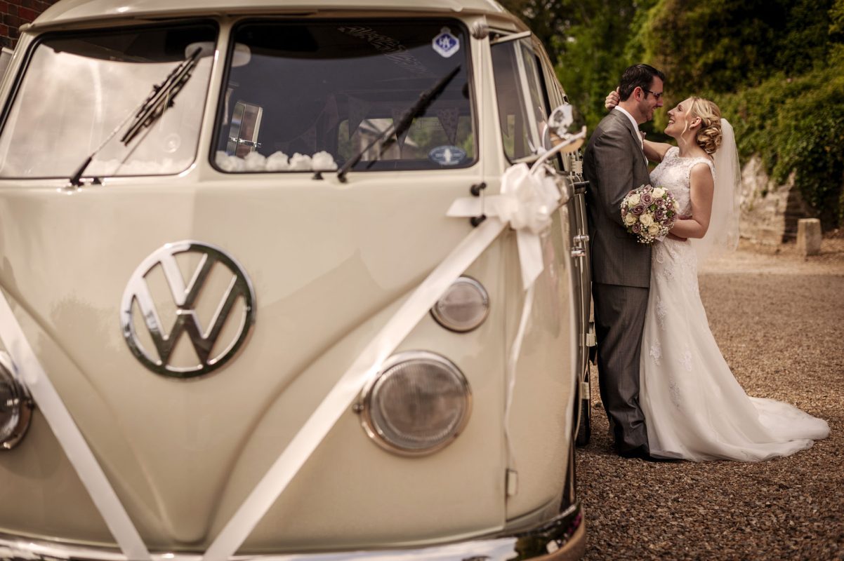 Bride-and-groom-with-vw-camper